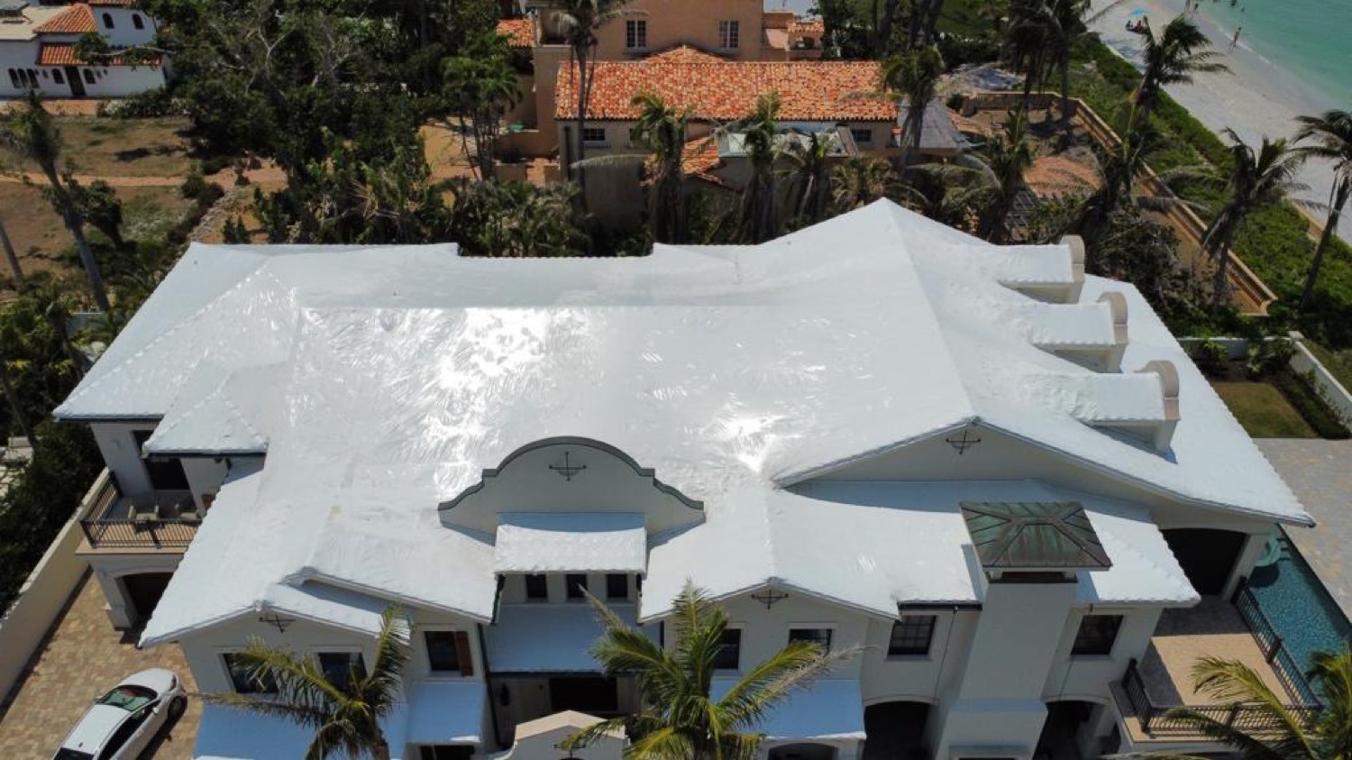 Beachfront estate under an emergency RoofWrap cover